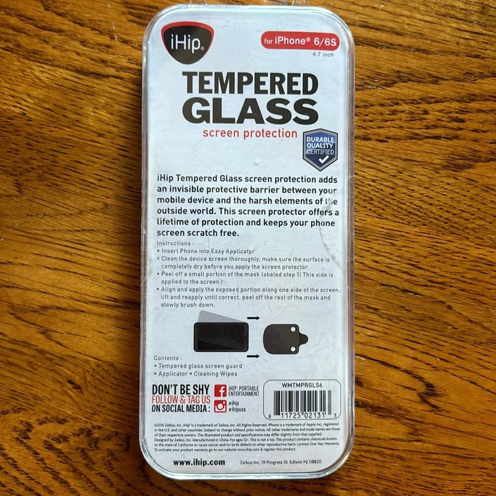 NWT. (New with tape intact). Never opened. Tempered glass iPhone 6/6s