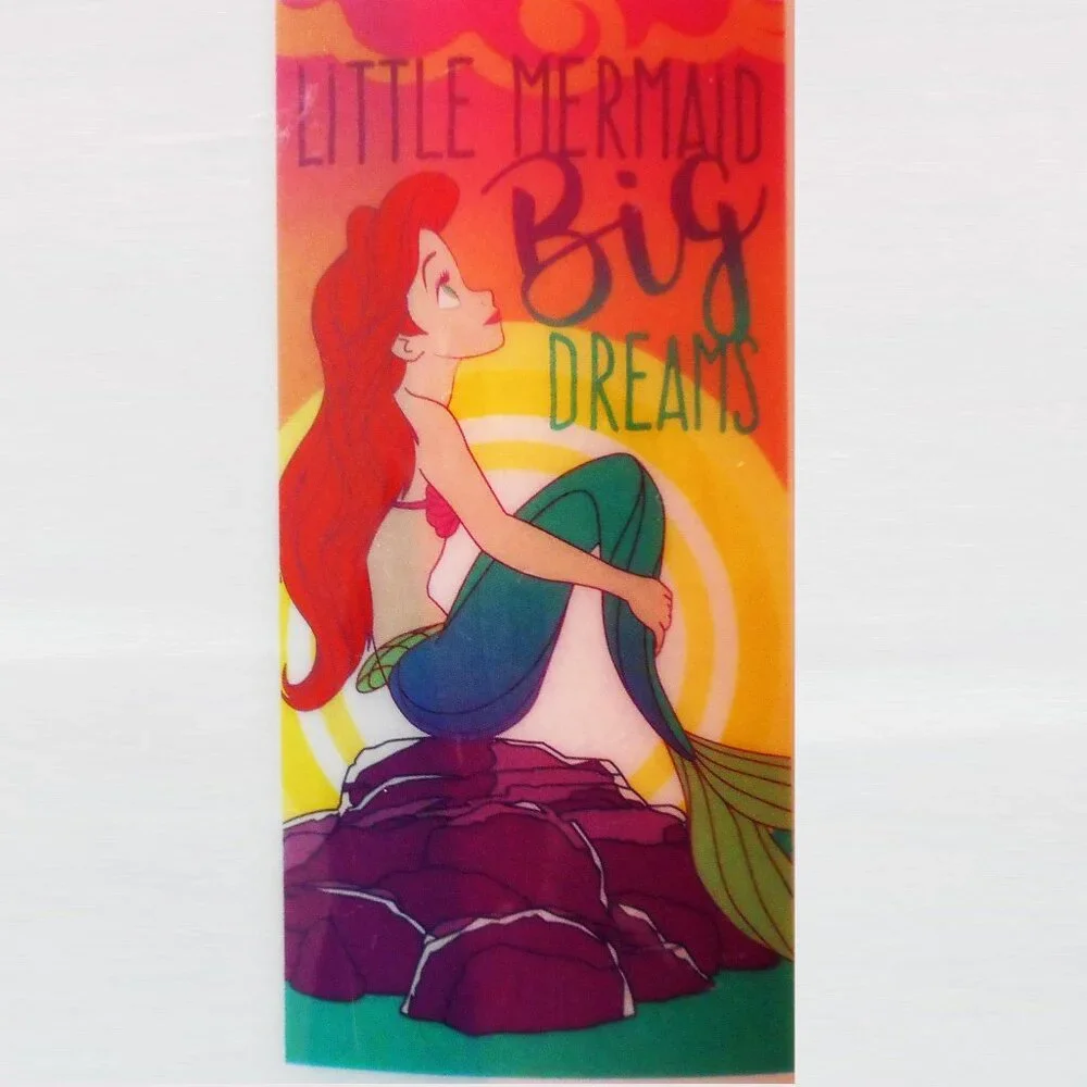 Little Mermaid Big Dreams Beach Towel measures 28 x 58 inches