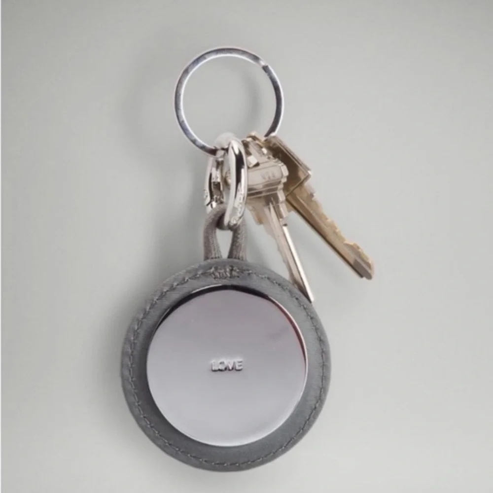 NWT Lululemon Unisex Logo Bag Charm & Keychain Silver/Silver Drop