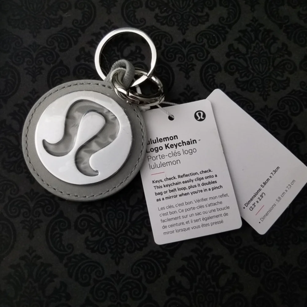 NWT Lululemon Unisex Logo Bag Charm & Keychain Silver/Silver Drop