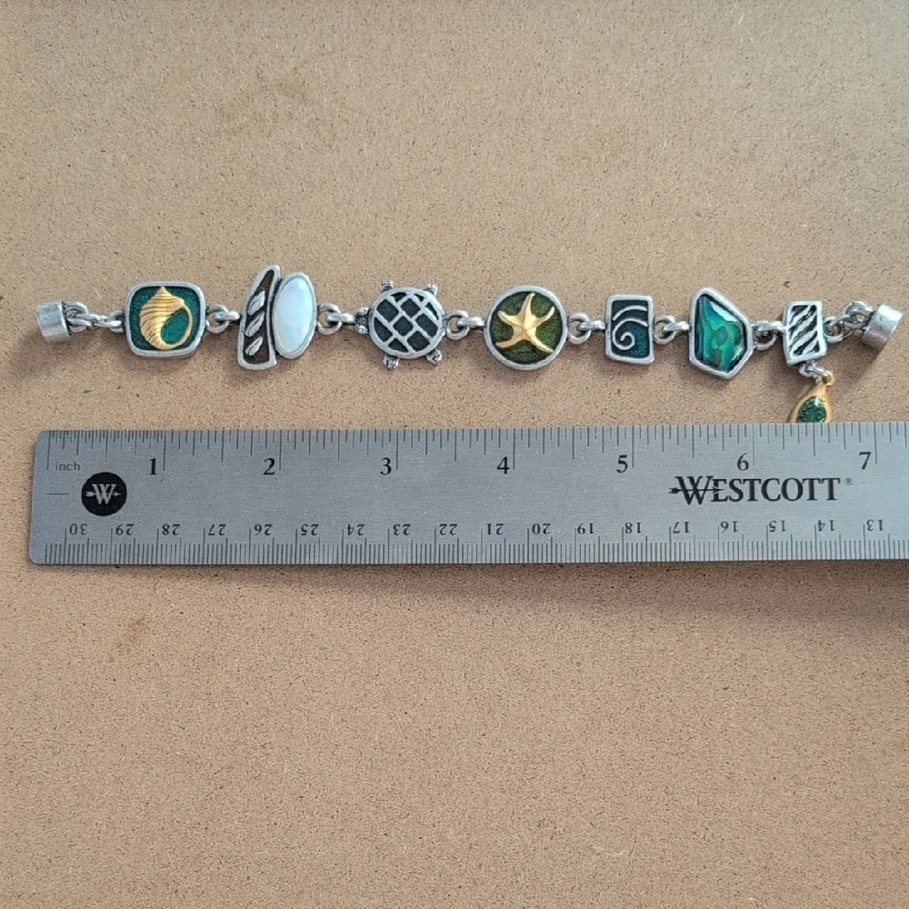 Artisan Silver and Gold Charm Bracelet