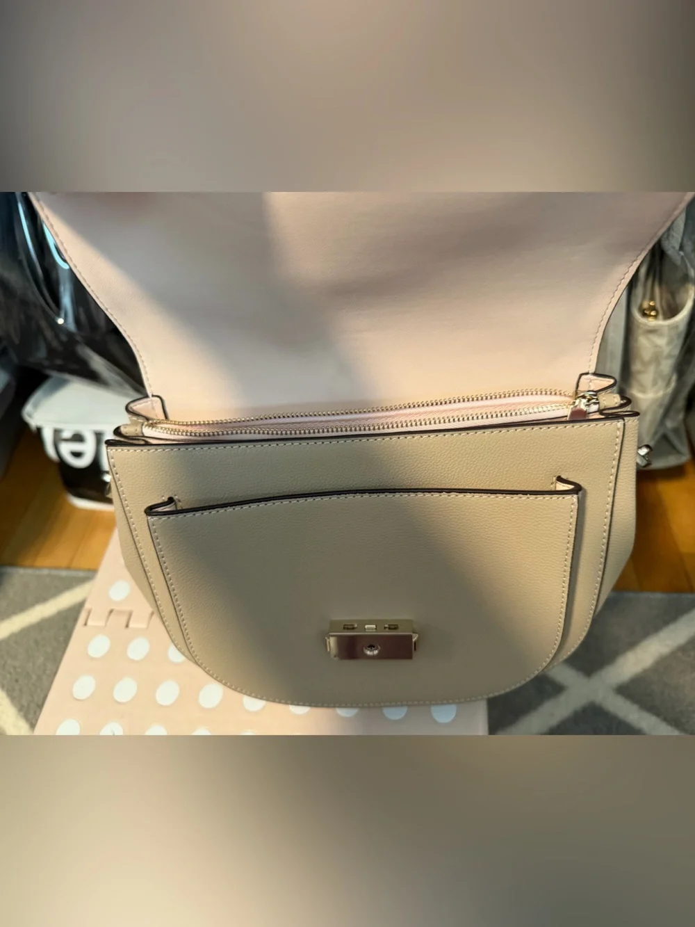 kate spade taupe leather saddle bag with patterned beige strap