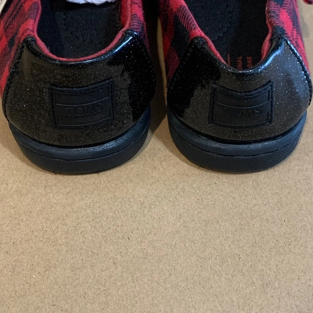 TOMS Black and Red Plaid Slip on shoes