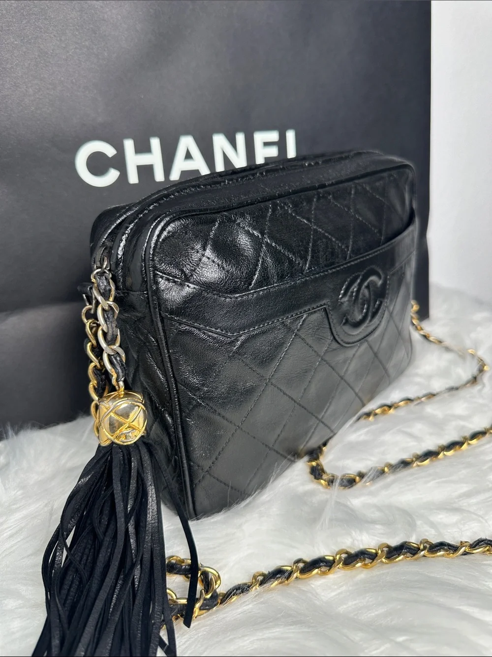 CHANEL Black Quilted Lambskin Crossbody with Tassel and Chain