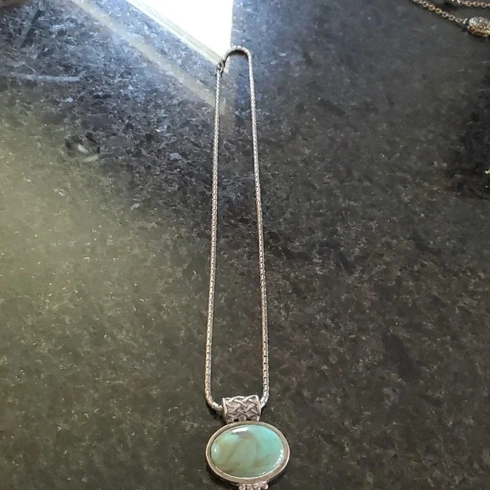 Green turquoise like slider stone with silver color long chain