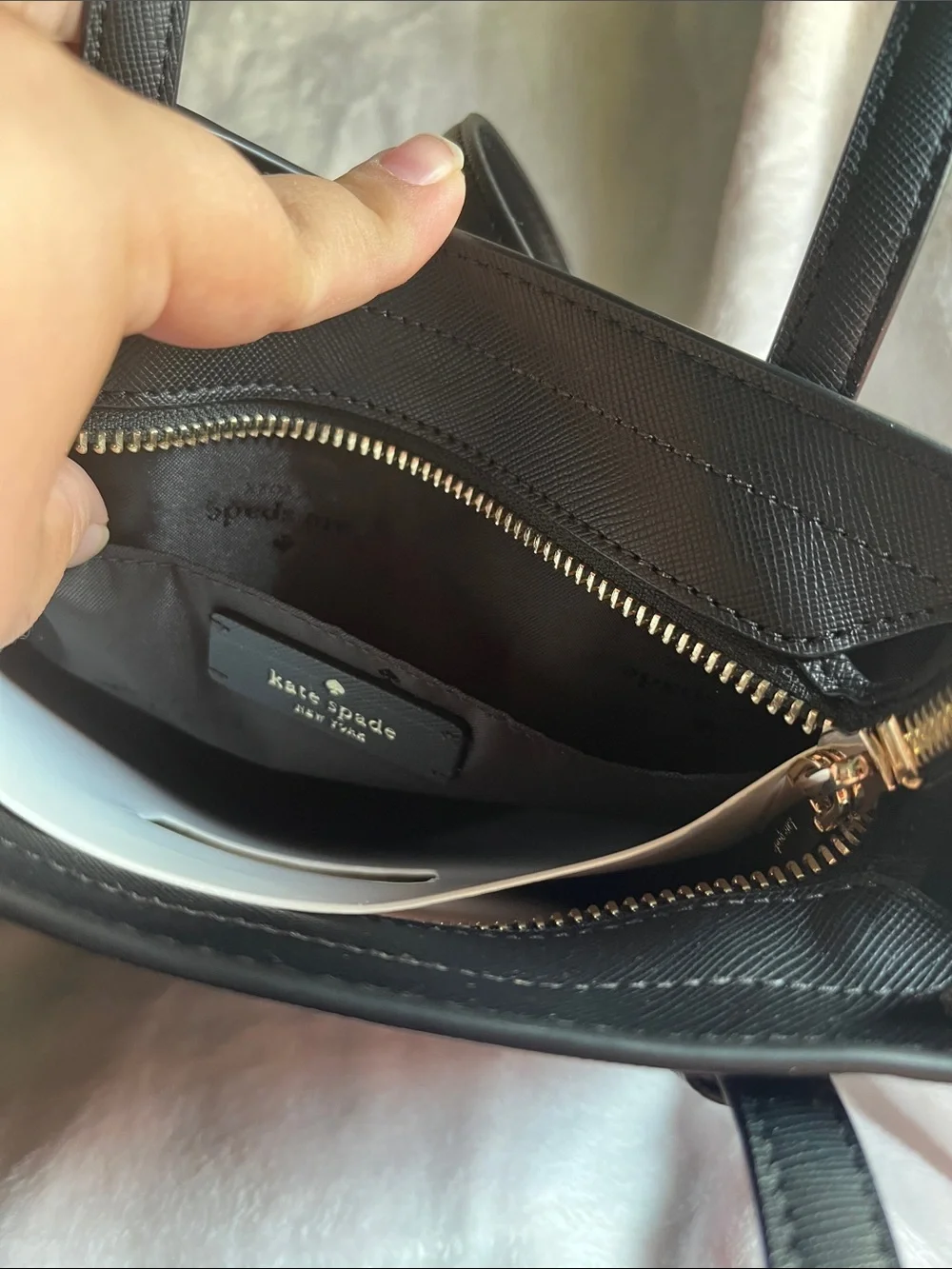 kate spade features spade