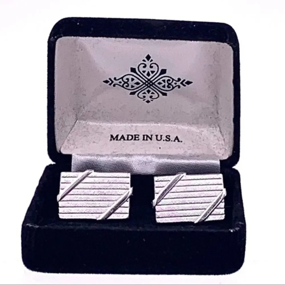 silver‎ tone Cuff Links with toggle closure.
