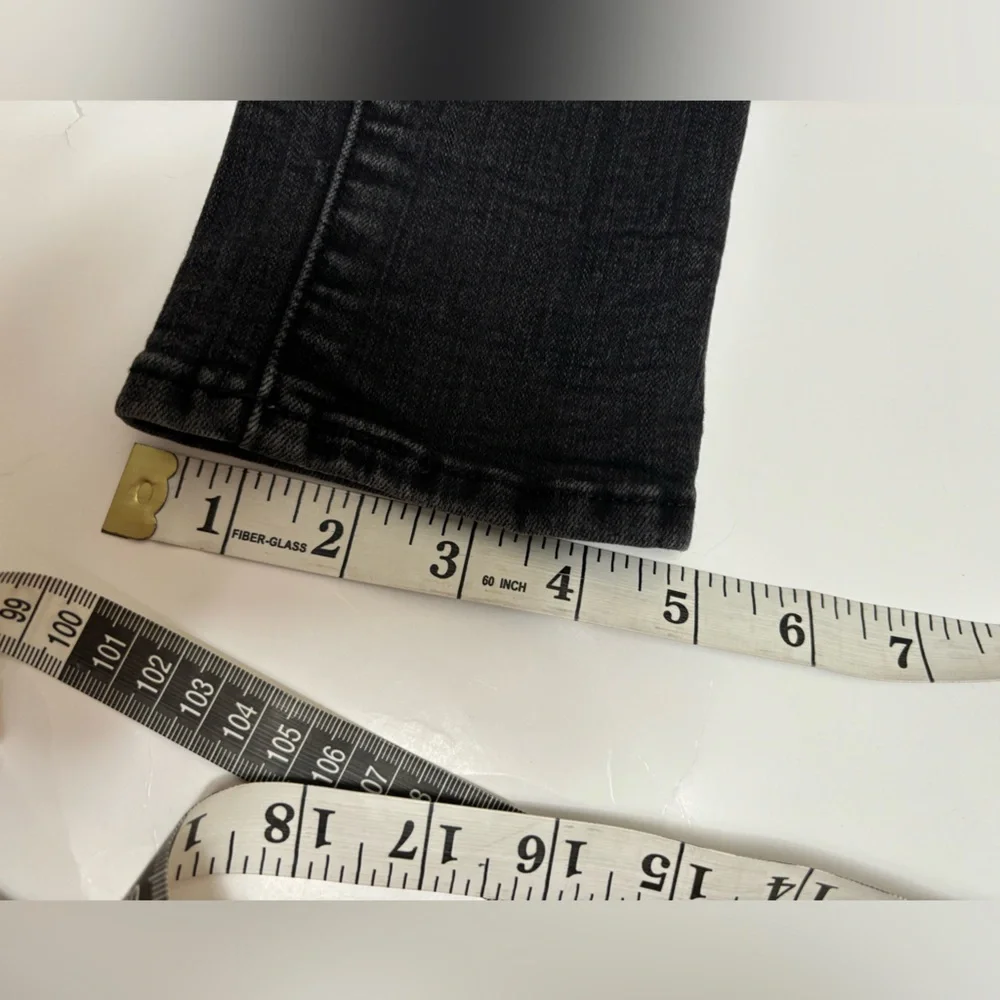 Levi’s 711 skinny black distressed‎ low rise jeans 26 ripped holes