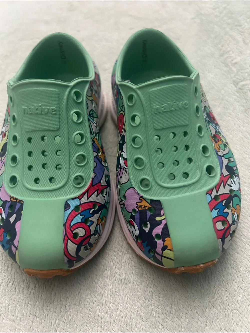 Native Disney Kids Slip-On Water Shoes in Mint Green with Multicolor Graphic