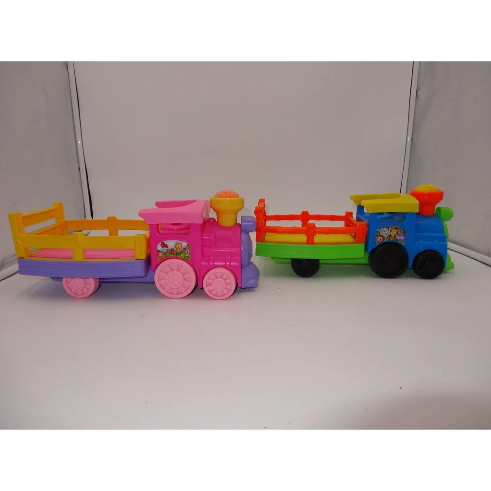 Fisher Price Little People Pink Musical Zoo Train and Musical Safari Train Set