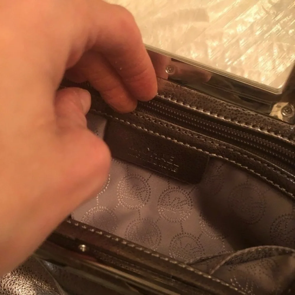 Michael kors silver leather convertible clutch bag