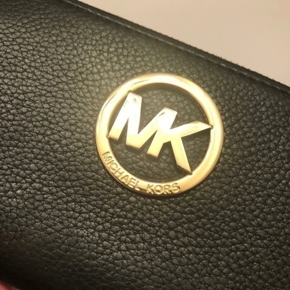 Michael Kors few scuffs minor