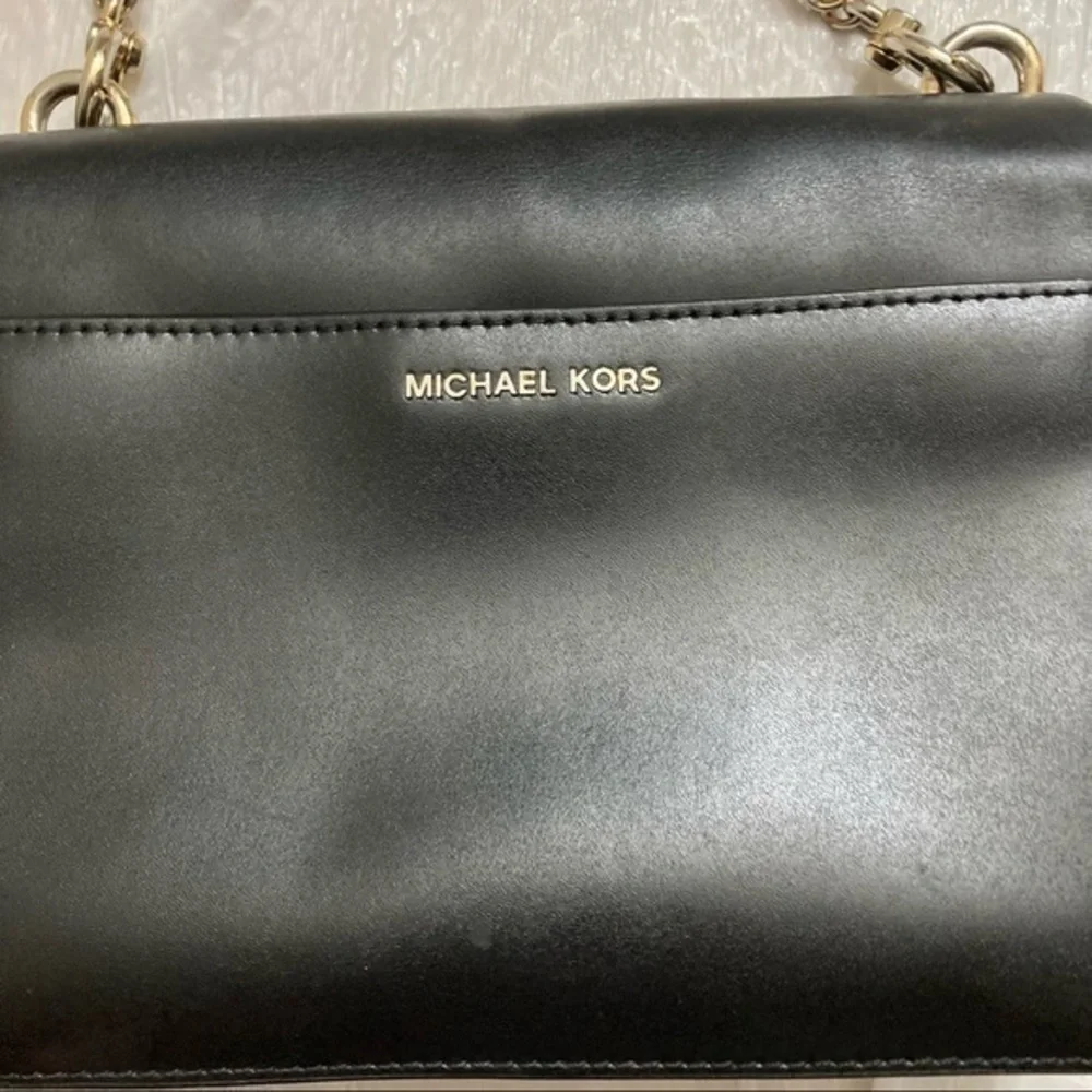 Michael Kors wear light hardware