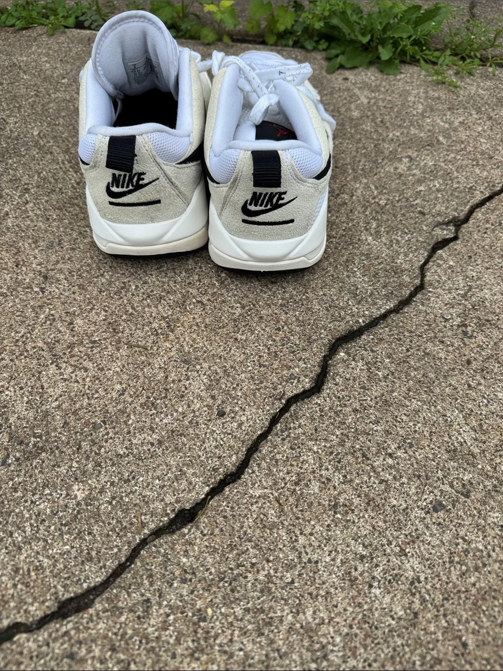Nike Jordan Men’s White and Black Low-Top Sneakers with Red Logo