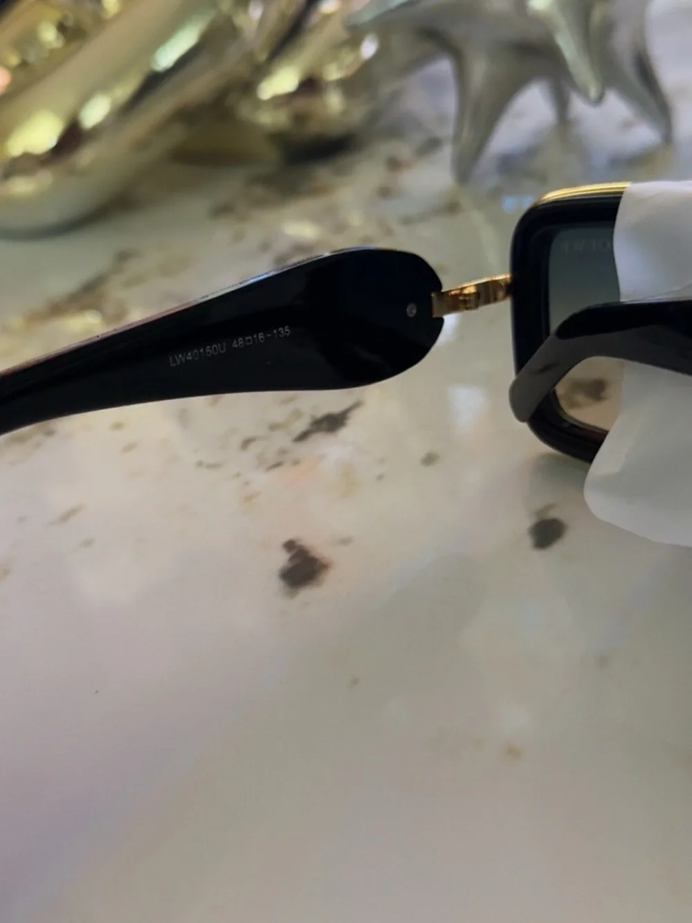 Loewe Black Sunglasses with Gold Accents and Gradient Lenses