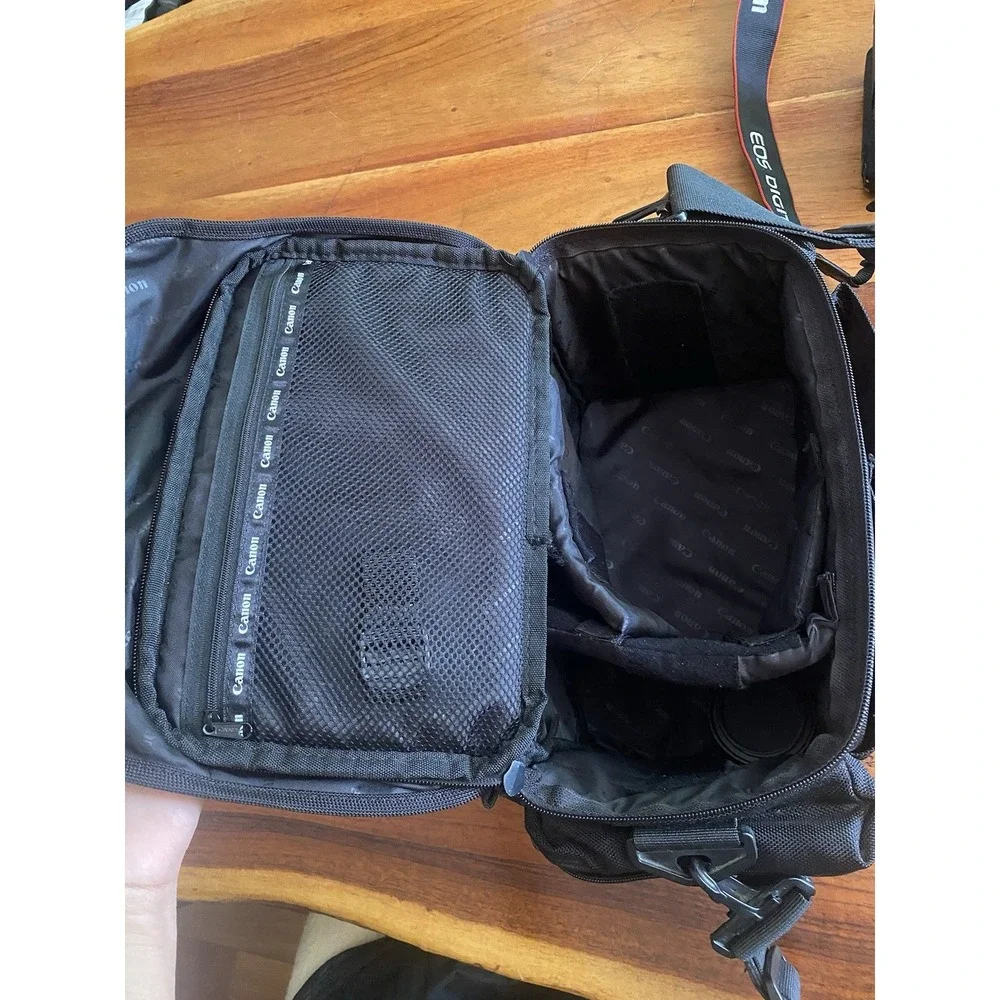 Canon EOS Rebel T3I 18 MP Digital SLR Camera with two Lenses, Charger And Bag