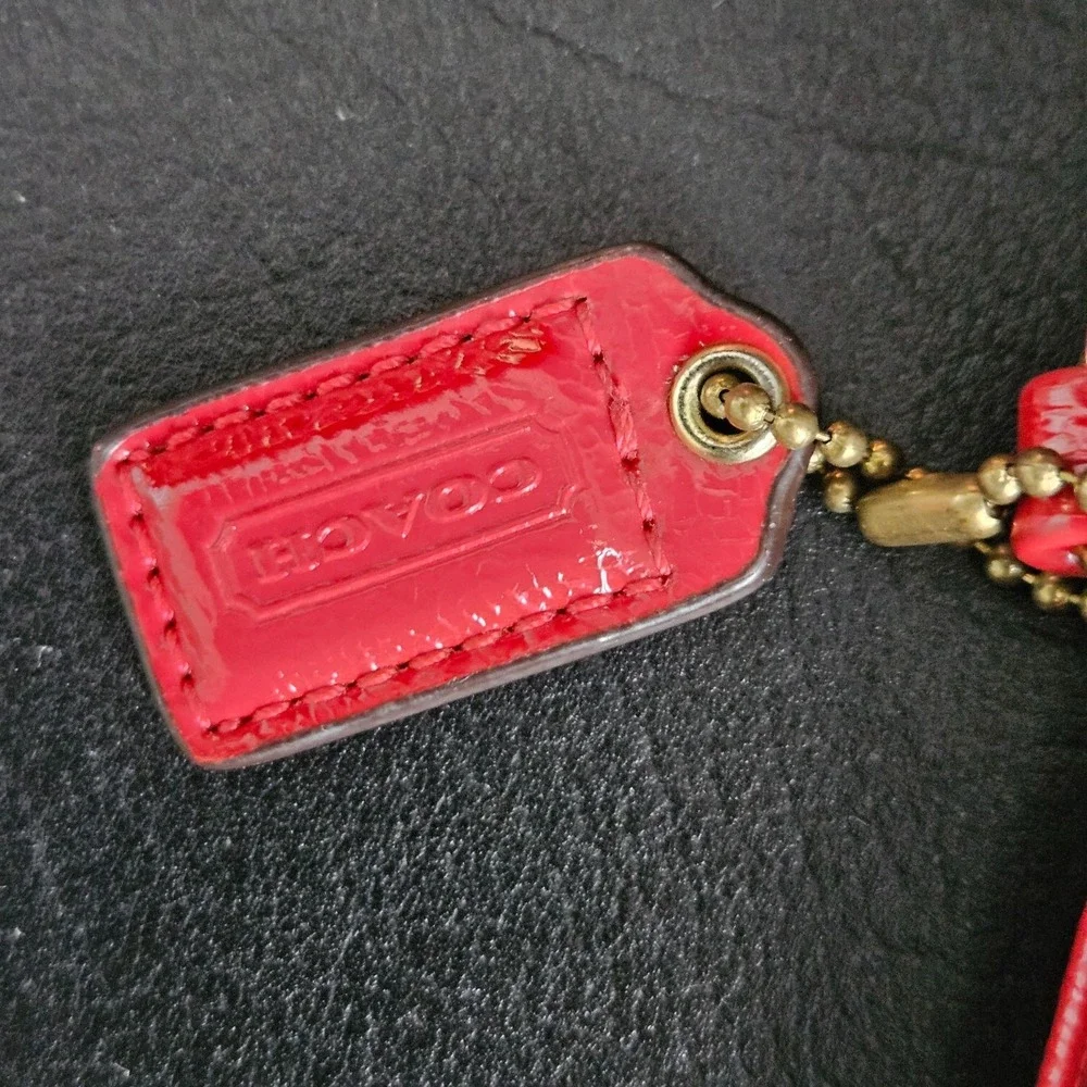 Coach signature wristlet