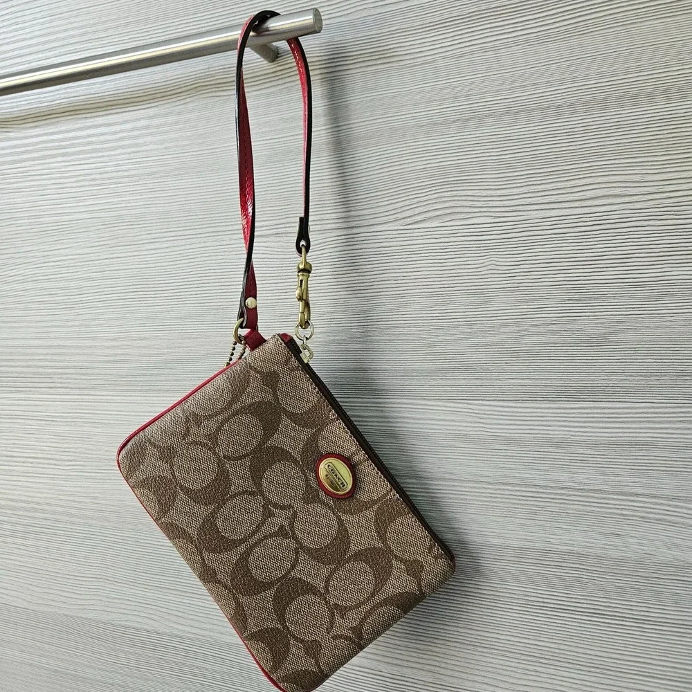 Coach signature wristlet