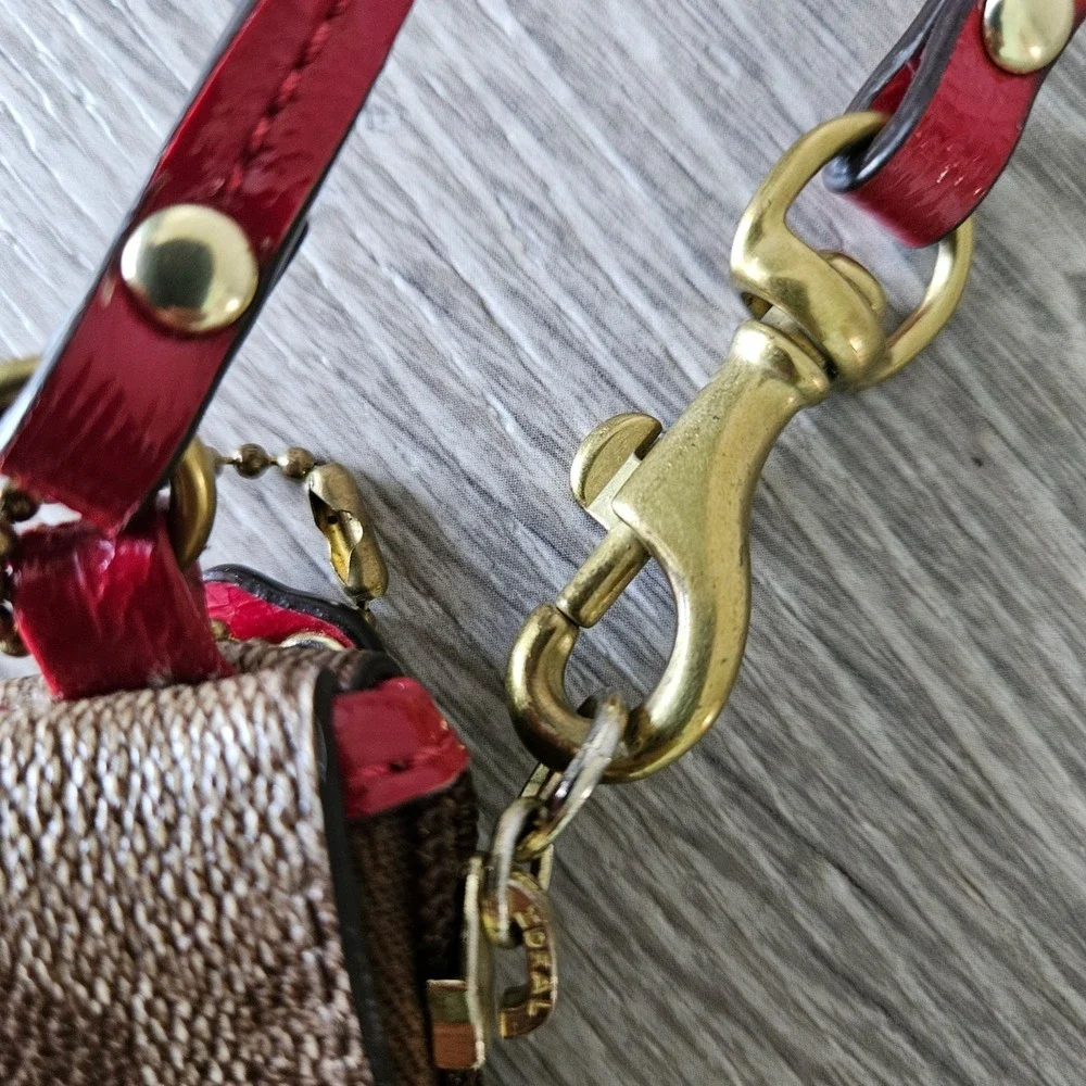 Coach signature wristlet