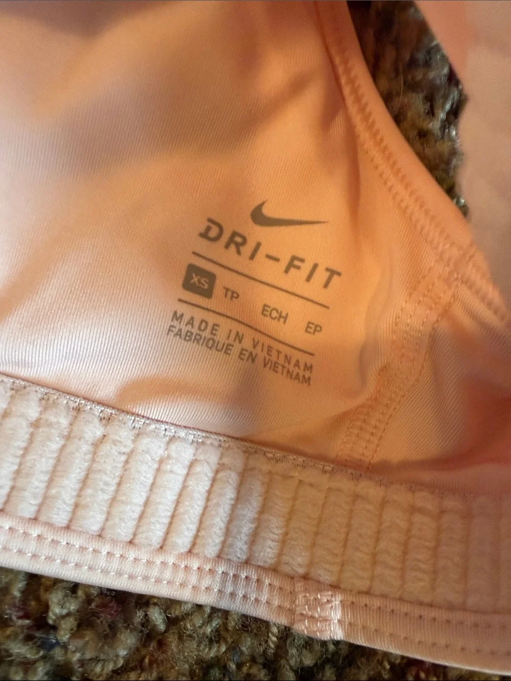 Nike Light Pink Racerback Sports Bra with Black Swoosh