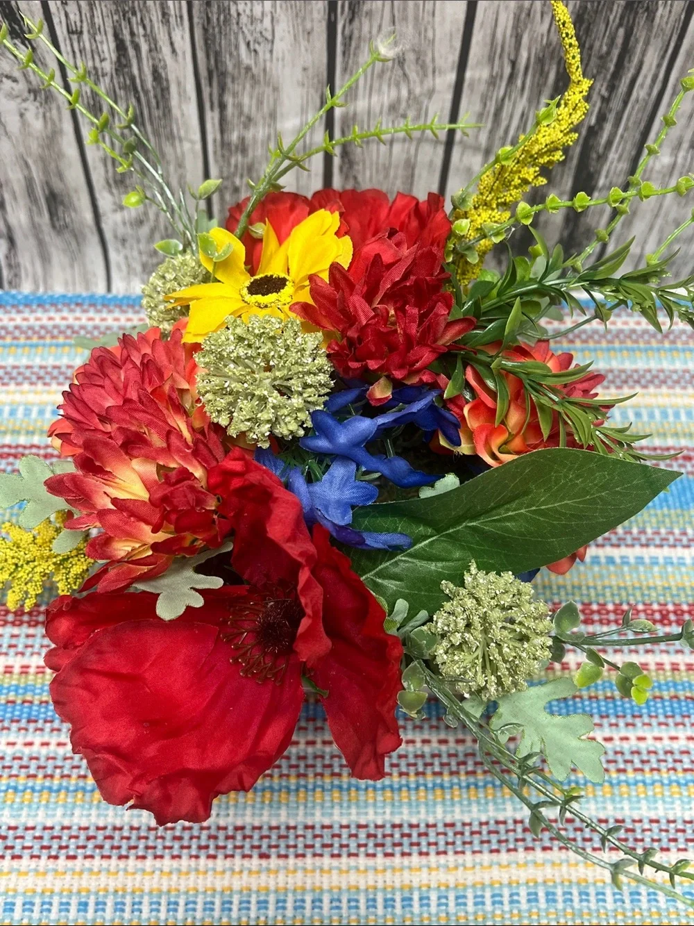 Pioneer Woman Ceramic Berry planter with red and yellow floral arrangement