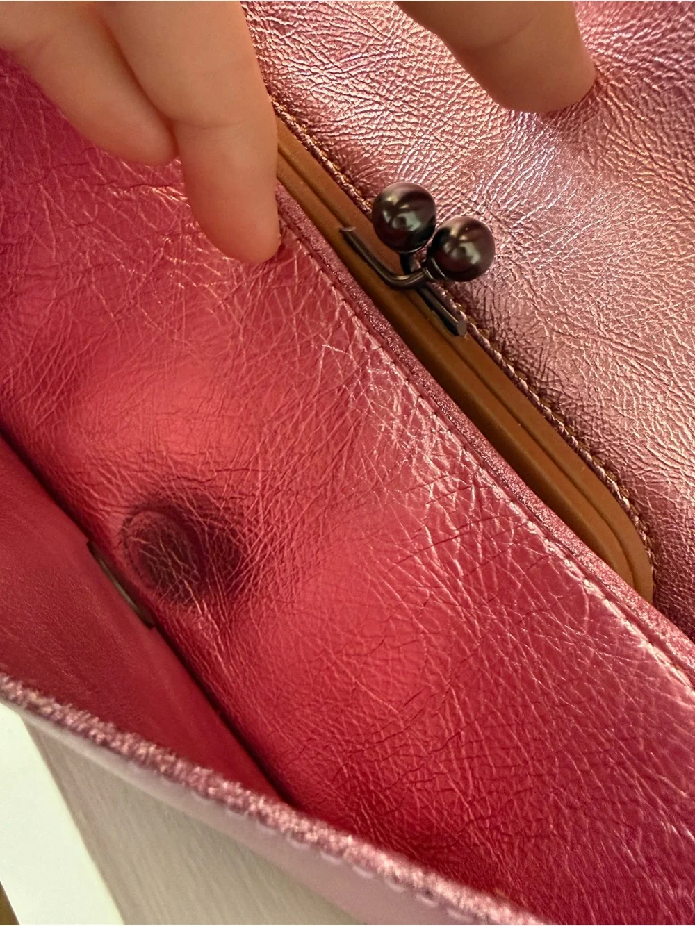Coach front tiny closely