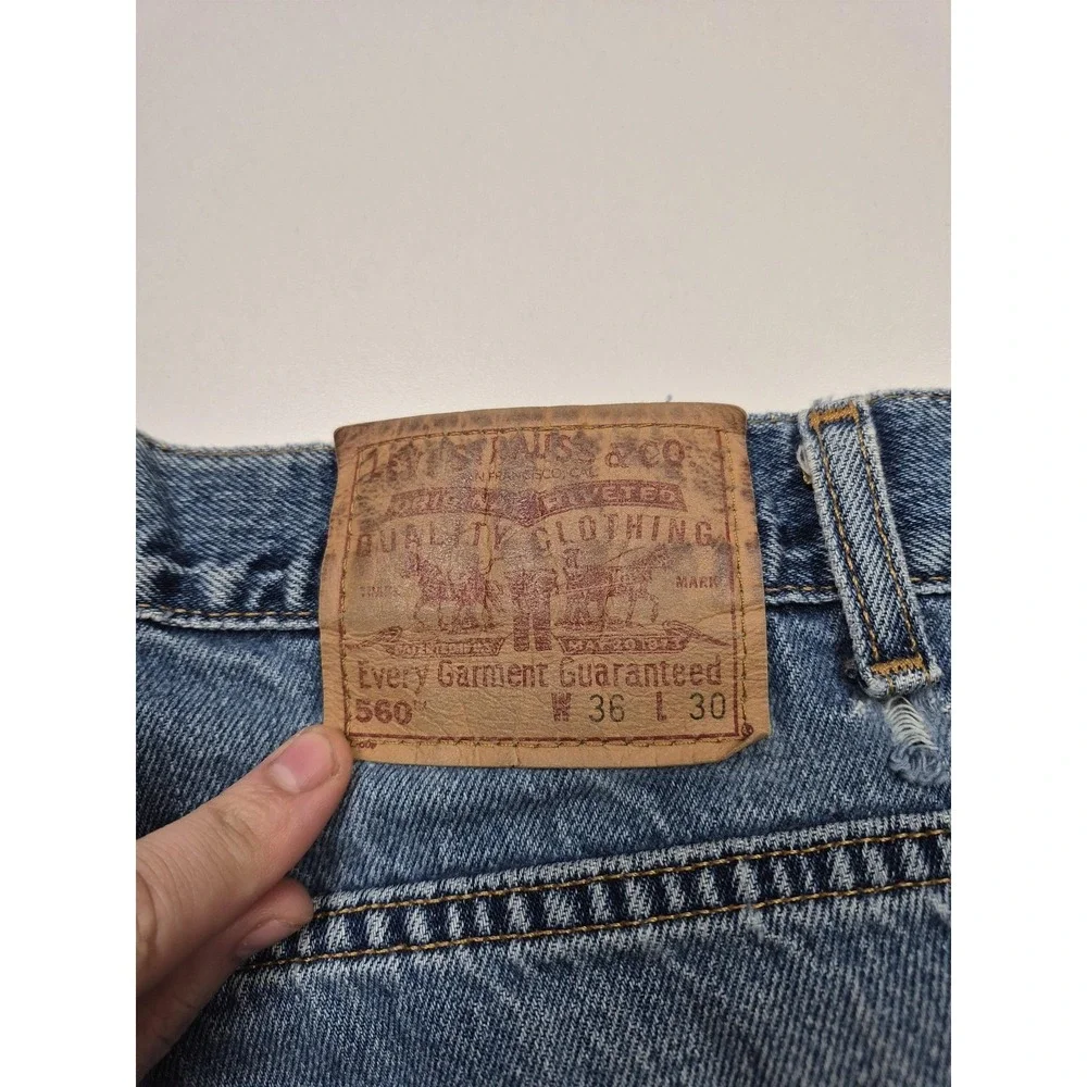 Vintage Levis 560 Loose Tapered Jeans Mens 36x30 Blue Denim USA 90s Distressed