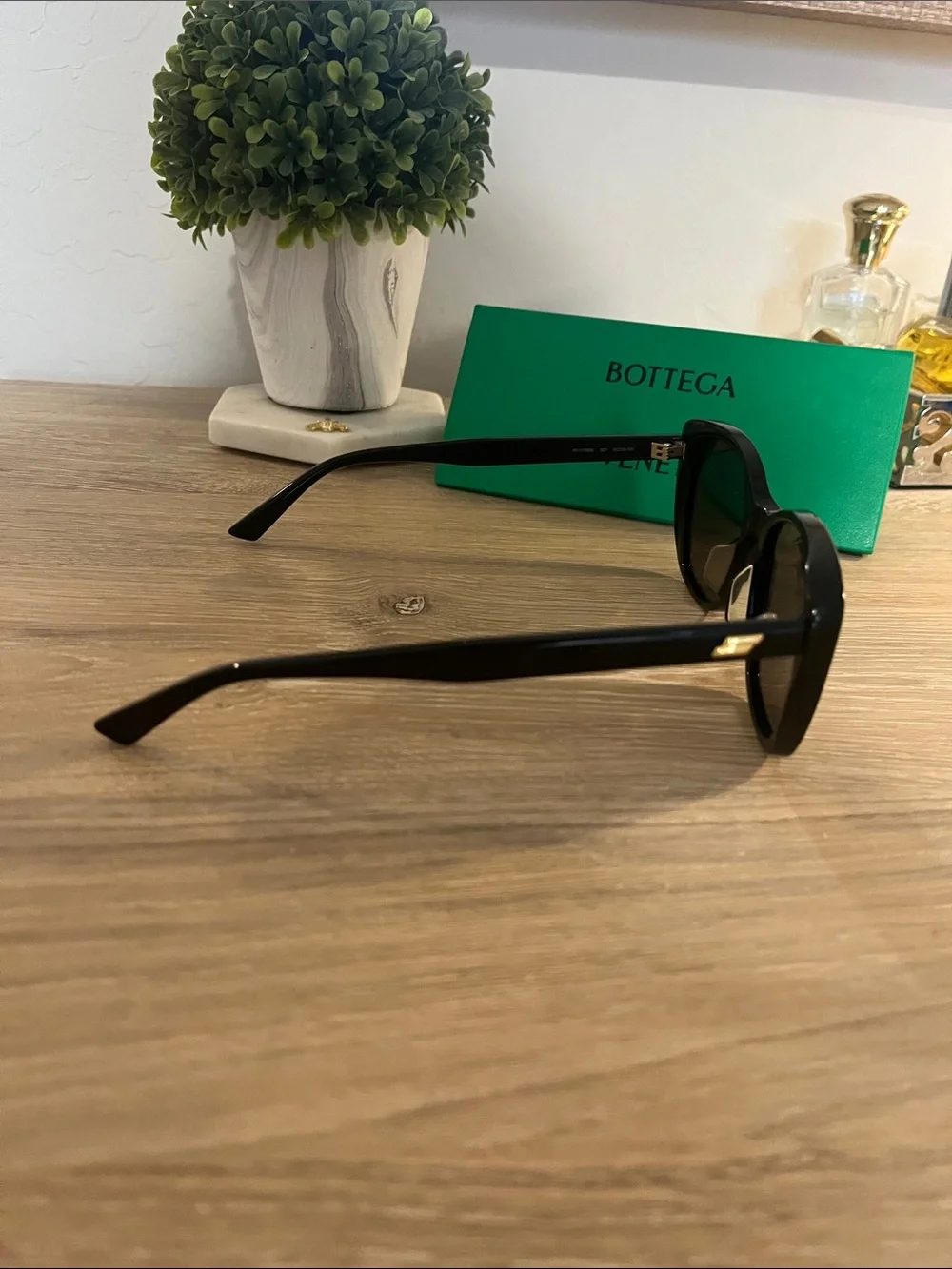Bottega Veneta sleek glossy dark