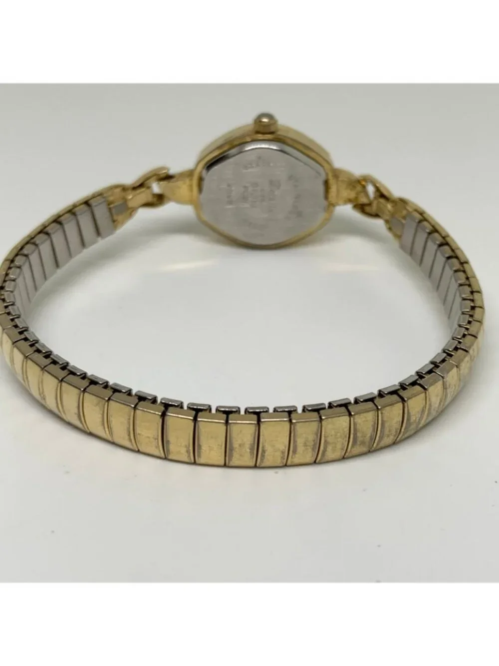 Vintage details gold tone women’s watch oval 19mm quartz stretch band running