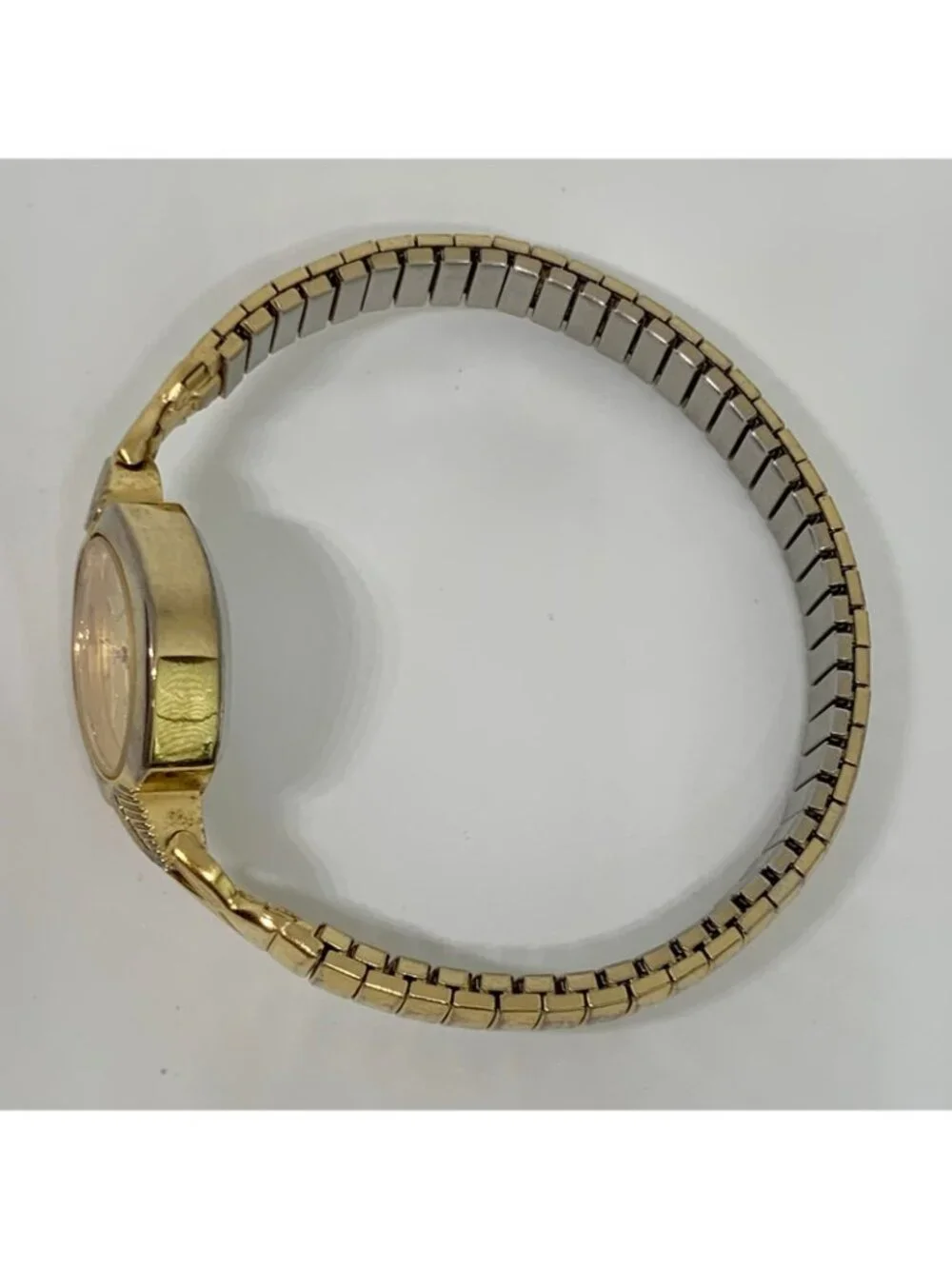 Vintage details gold tone women’s watch oval 19mm quartz stretch band running