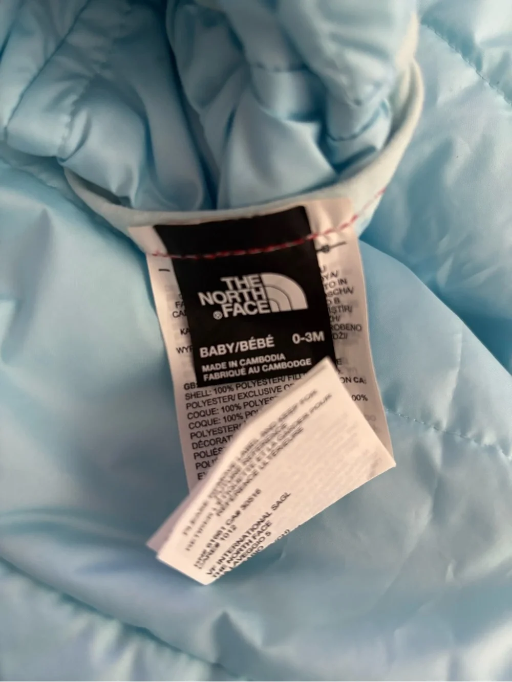 The North Face. Baby coat.  Reversible blue