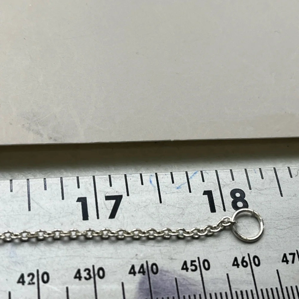 N/A stunning silver‑tone