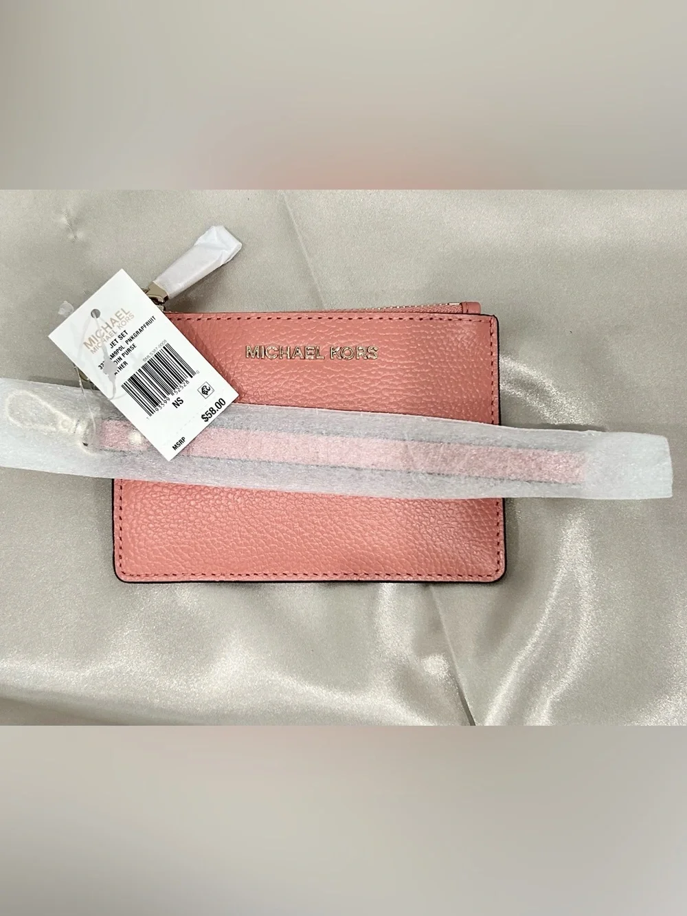 Michael Kors Coral Pink Pebbled Leather Mini Wristlet