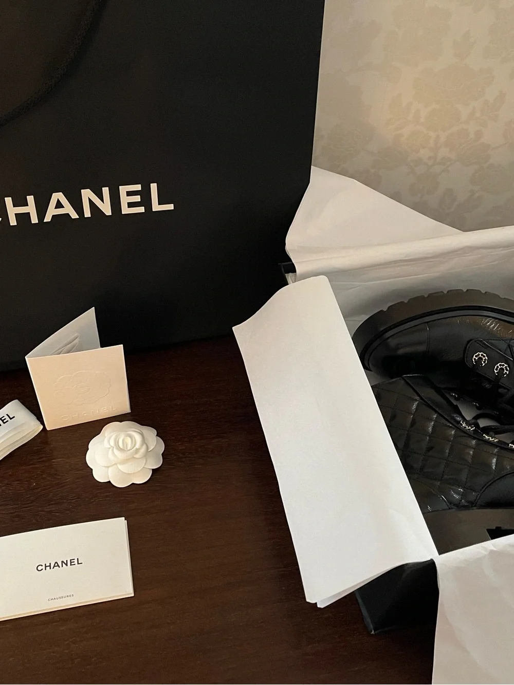 CHANEL Black Quilted Leather Lace-Up Combat Boots with Gold Chain CC.