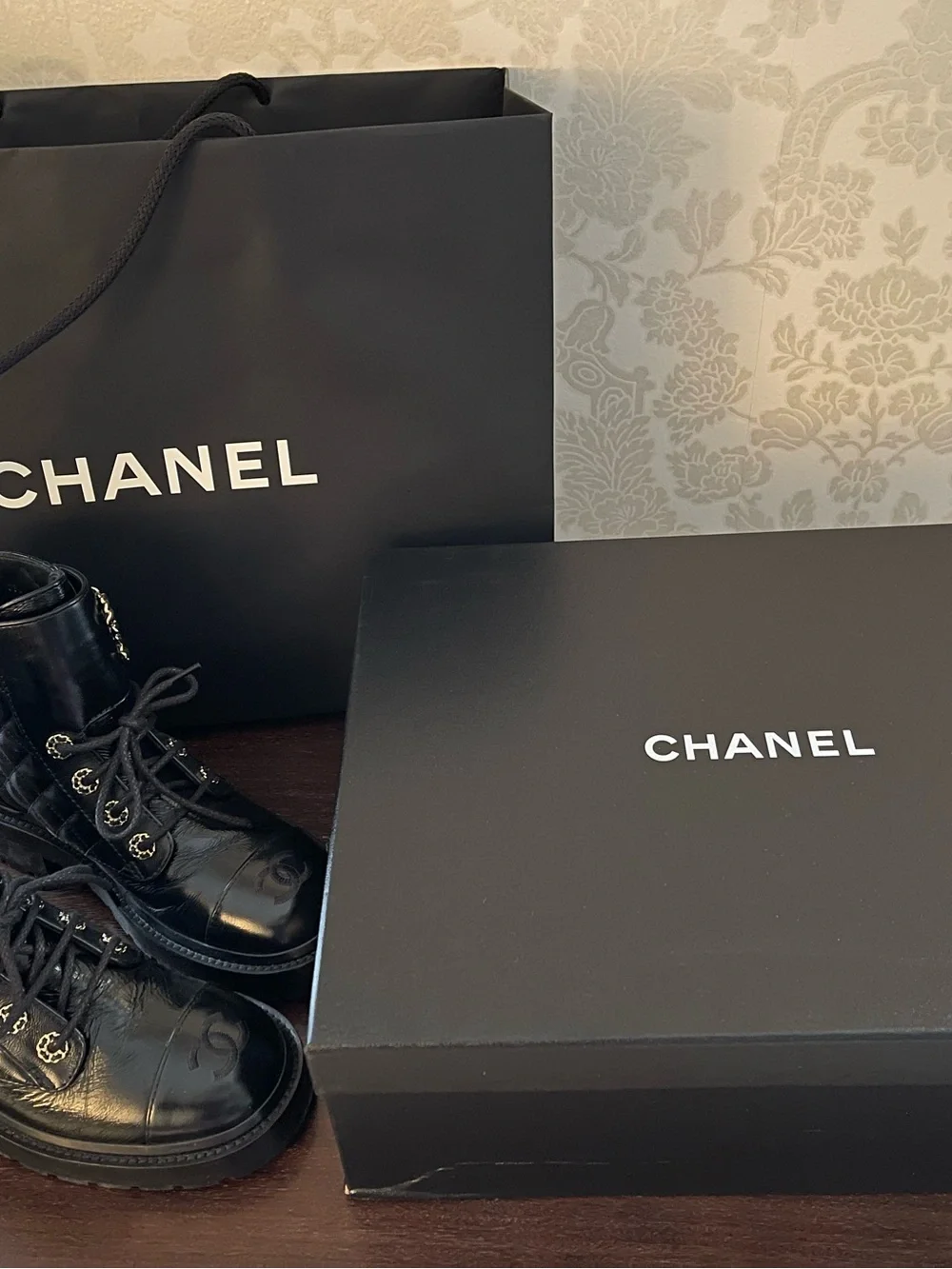 CHANEL Black Quilted Leather Lace-Up Combat Boots with Gold Chain CC.