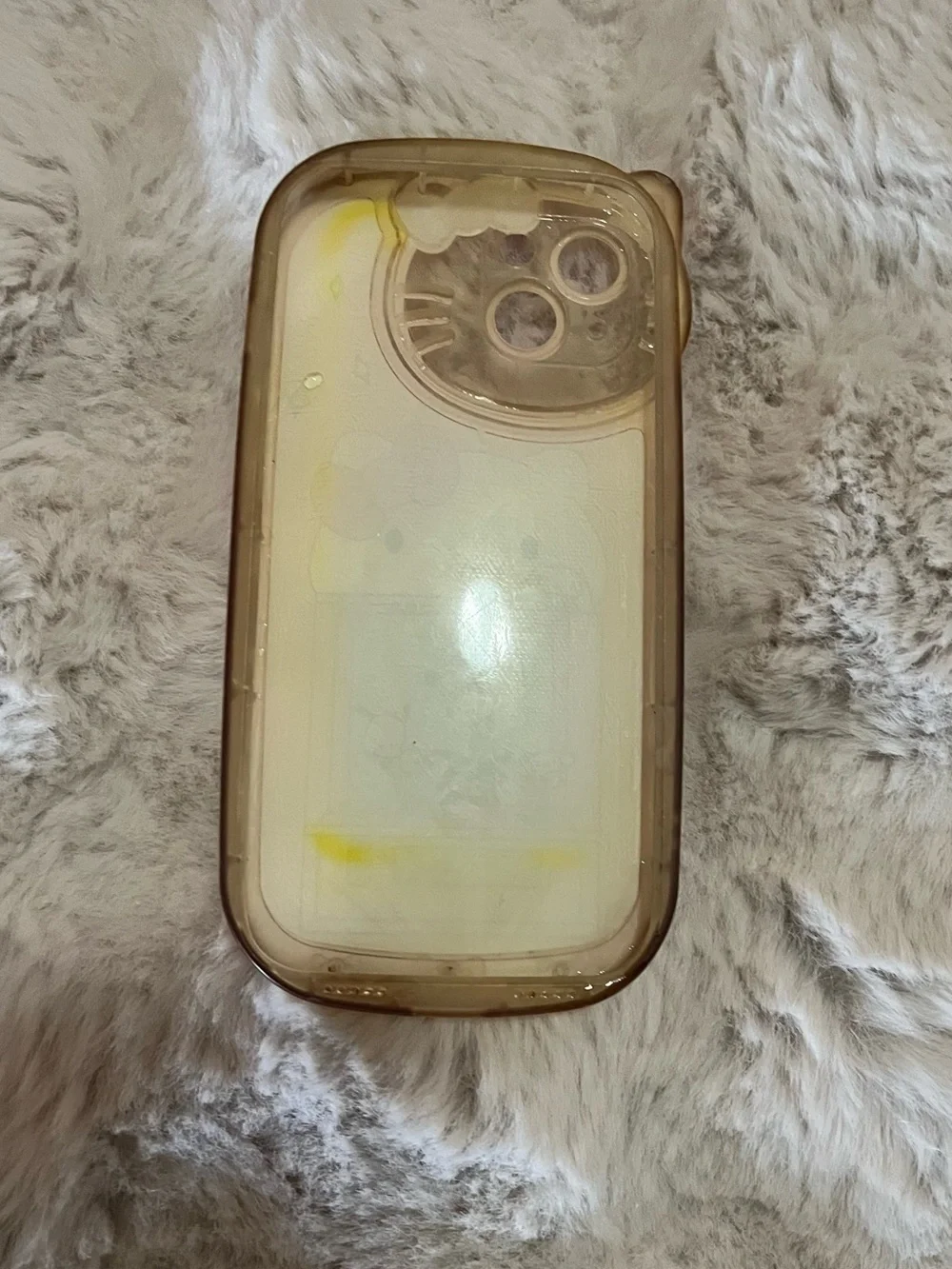 Hello Kitty and friends pink iPhone 13 phone case.
