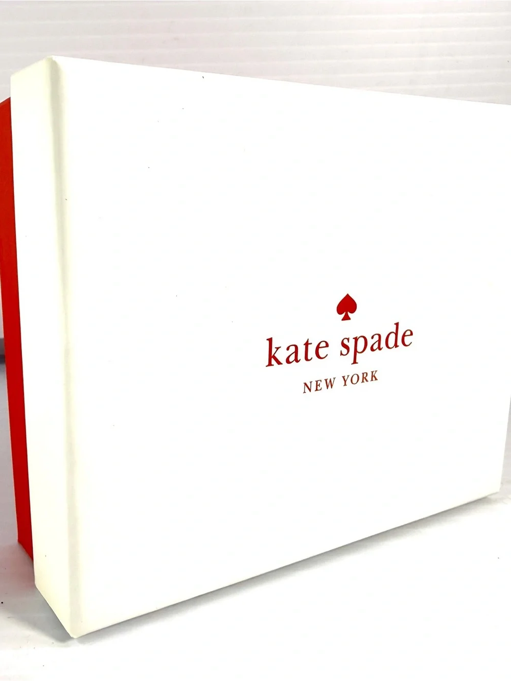 kate spade leather logo