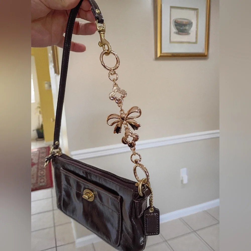 Coach Ergo patent leather wristlet