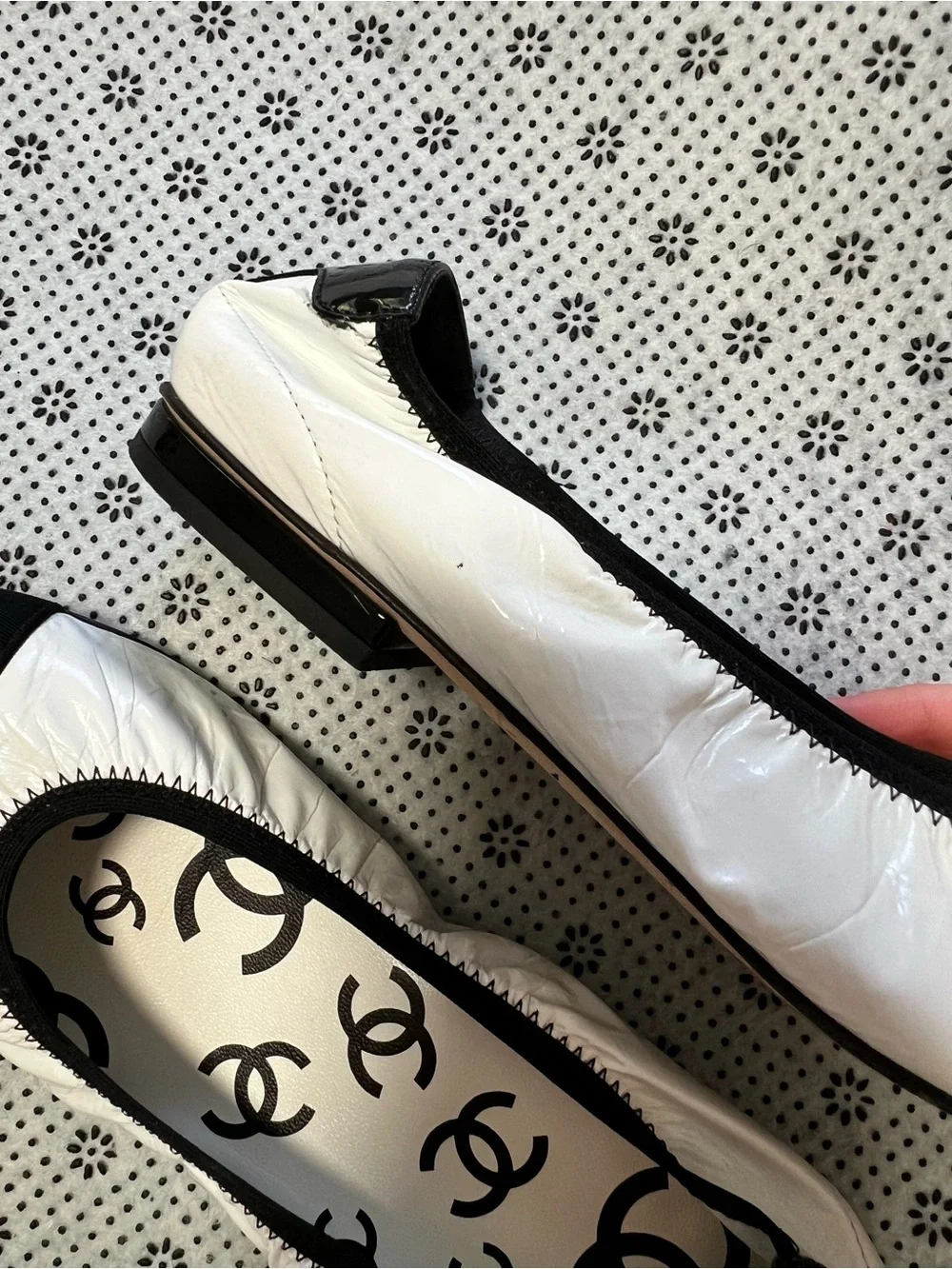 CHANEL White Ballet Flats with Black Cap Toe