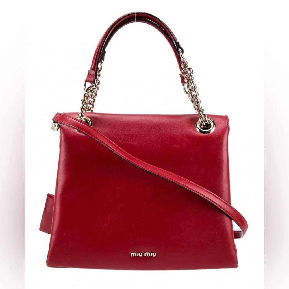 Miu Miu 	•	hardware silhouette shoulder