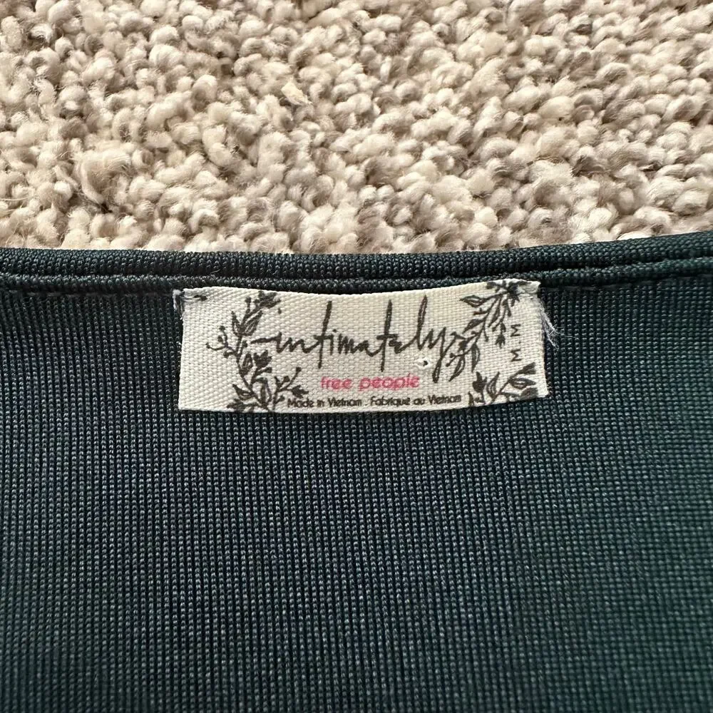 Free People Intimately dark green long sleeve v-neck bodysuit size M