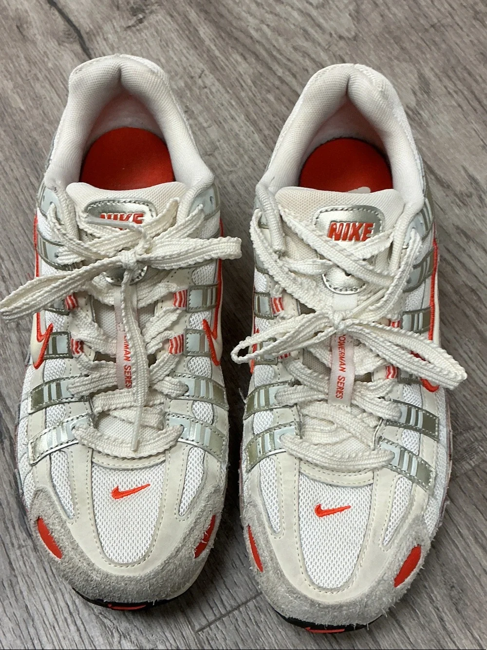 NikeWhite and Orange Lightweight Sneakers