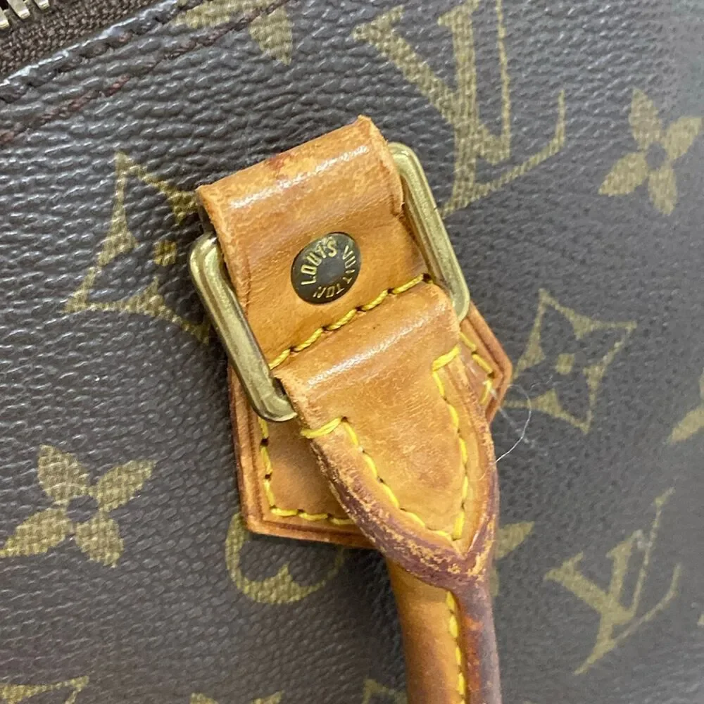 Louis Vuitton Alma Monogram Handbag M51130
