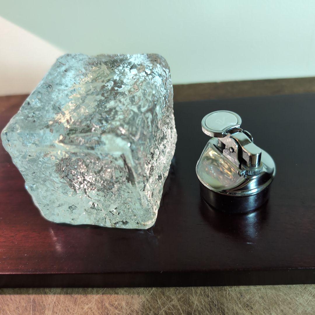 New, unused Maruman tabletop lighter, cigarette case, and ashtray set.