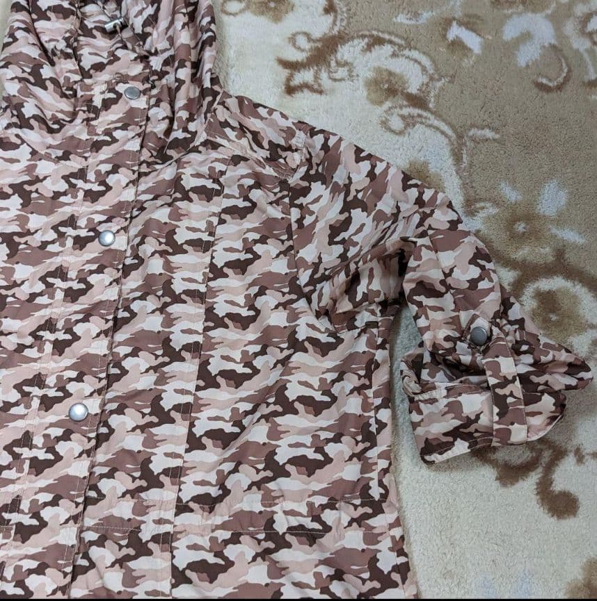 Raincoat, camouflage pattern, with storage bag, USED