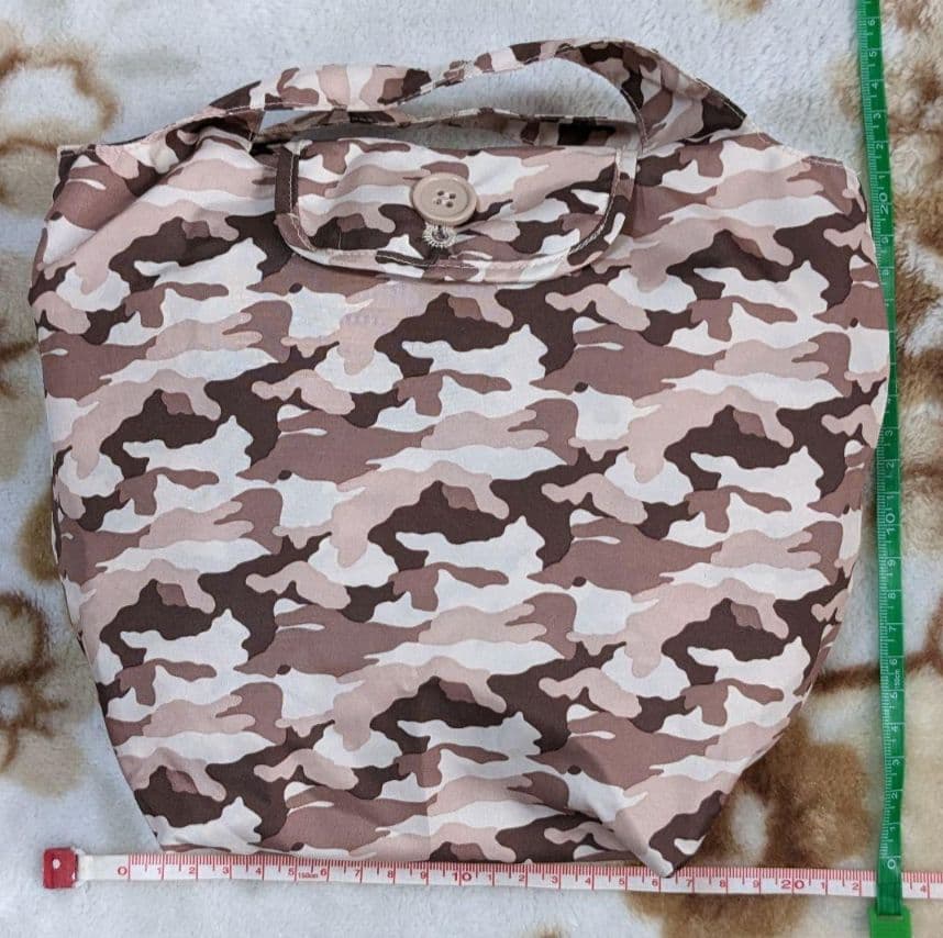 Raincoat, camouflage pattern, with storage bag, USED