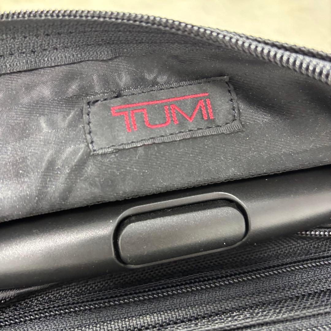 TUMI <div class=gnlqyh