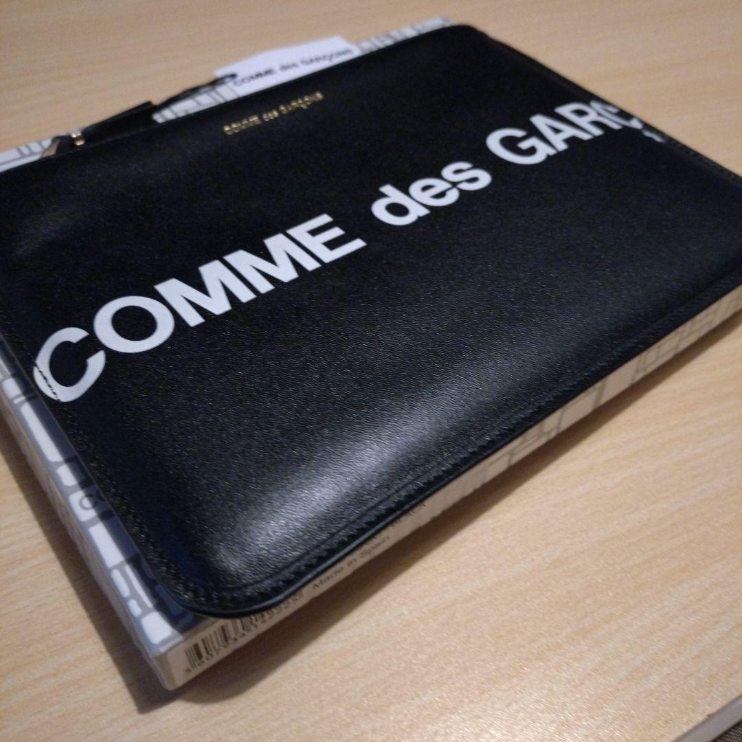 New, unused. Comme des Garçons clutch bag.
