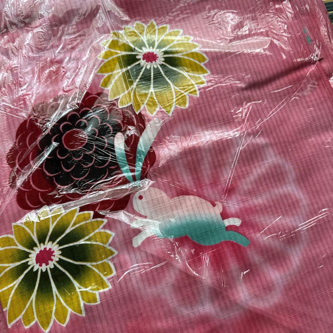 Pink yukata with rabbit and floral pattern