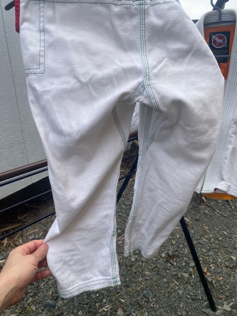 Kids' Jiu Jitsu Gi M1 One stain near the lower left abdomen (photo included)
